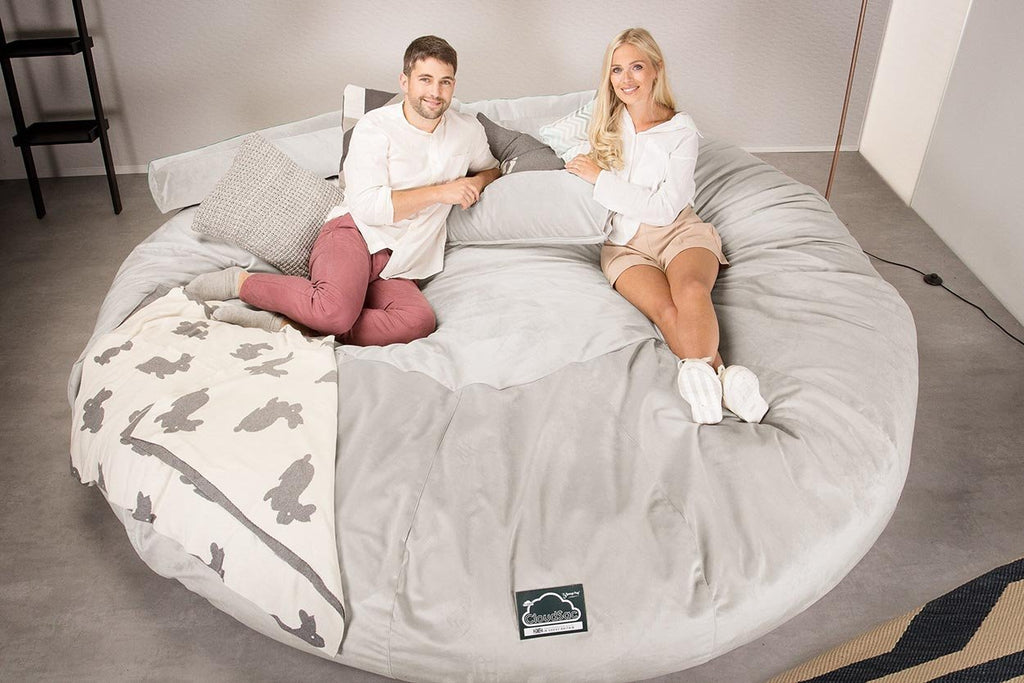 The Lounge Sack 5000 XXXL is a team sized memory foam bean bag. With vast amounts of space for 4 to spread out on, this beanbag can comfortably fit 8 people around its circumference.