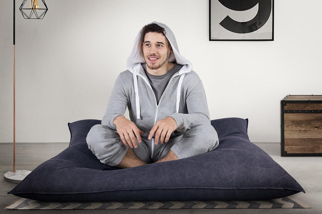 The simple and timeless pillow shape is adjustable and you can convert it into a giant floor pillow, a seat, or a lounger, dependent on the way you position it.